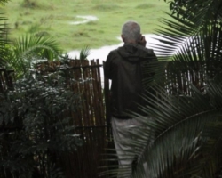 Simon watching Sitatunga antelopes, Kasanka National Park, Pontoon 3 camp